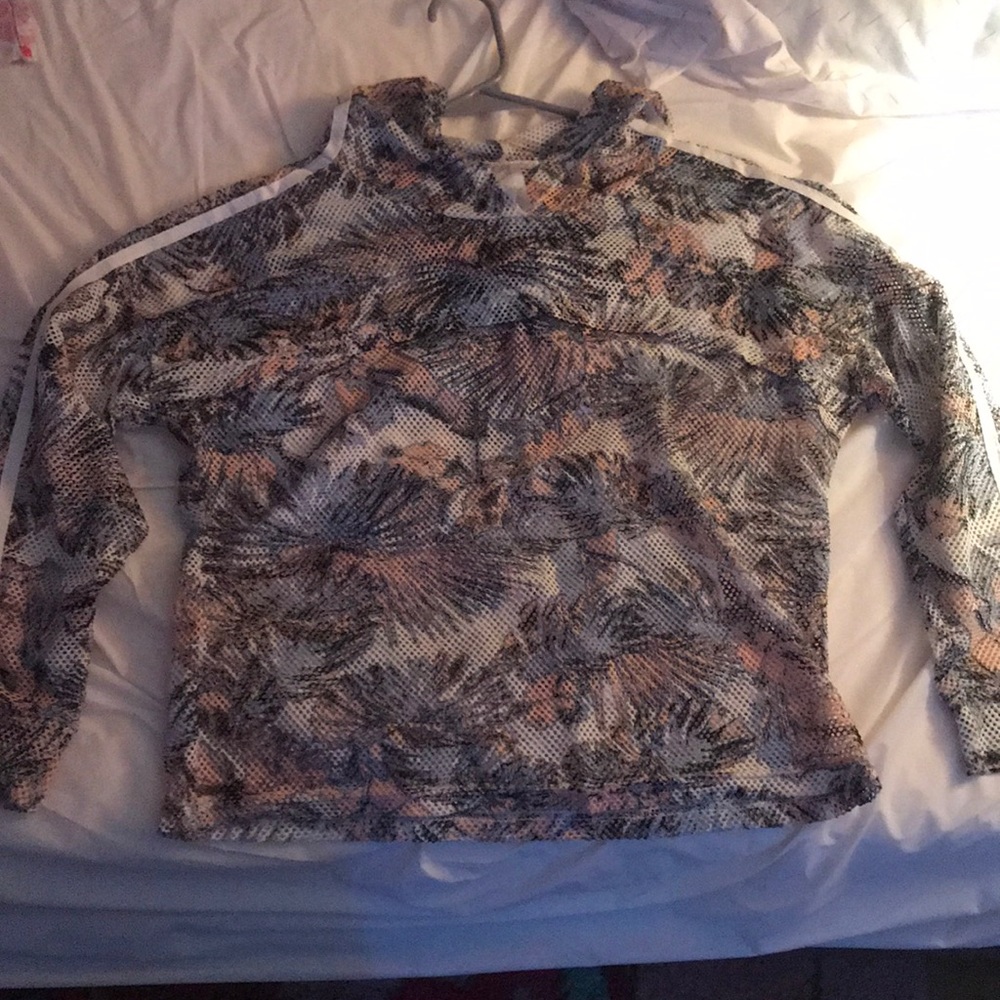 A mesh multicolored sweater